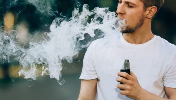 modern-young-man-with-a-beard-fun-vaporizers-outdo-2023-11-27-05-26-42-utc-2