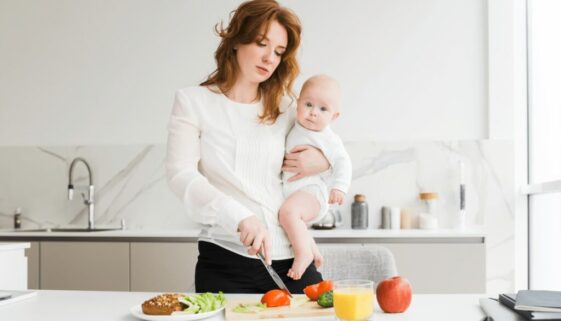 beautiful-mother-holding-her-cute-little-baby-whil-2024-10-20-06-09-29-utc-2