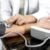 The female doctor measured blood pressure, the patient examined the heartbeat and sat down to talk about health care closely. health care concept.
