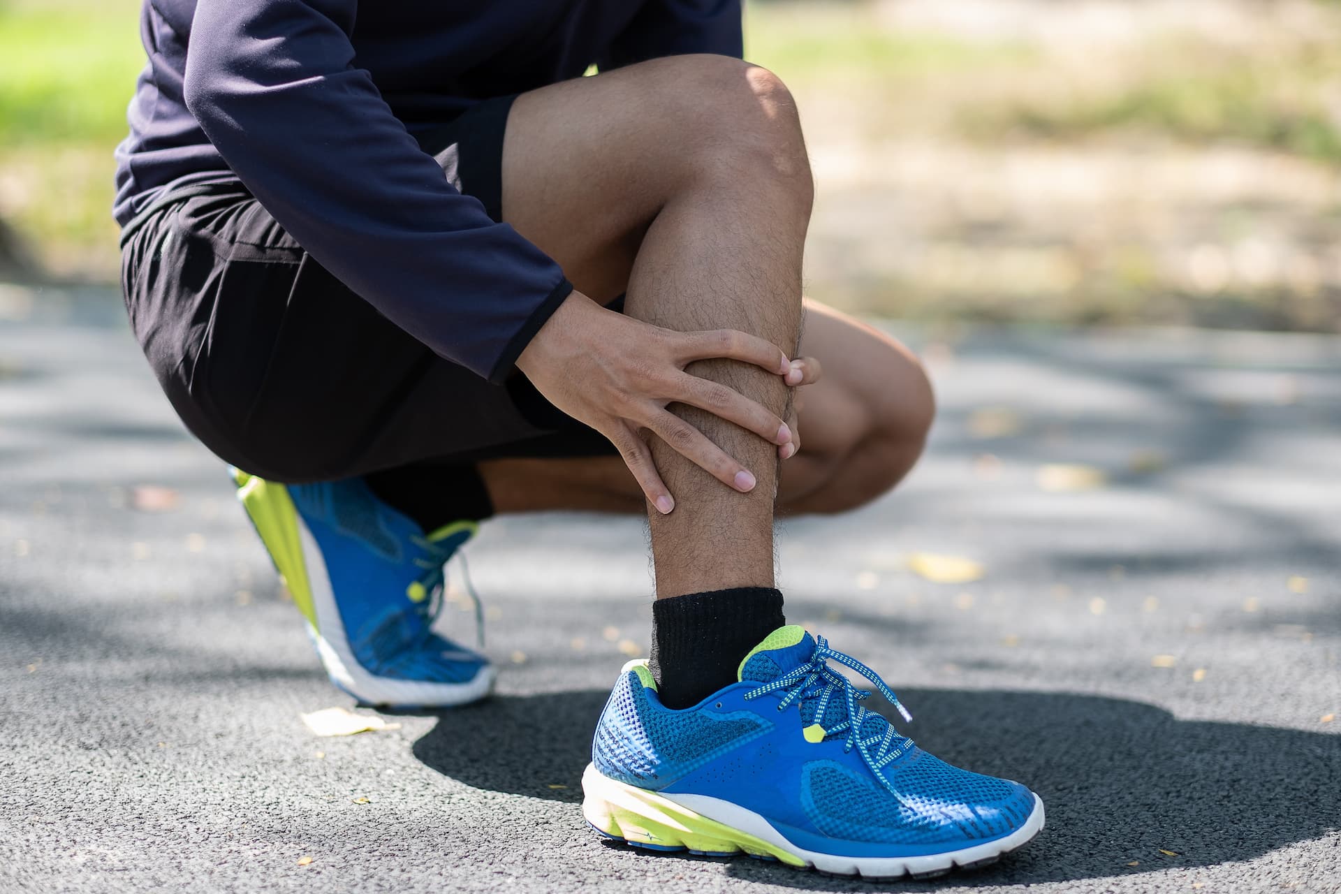 young-fitness-man-holding-his-sports-leg-injury-m-2026-03-24-04-49-51-utc-2